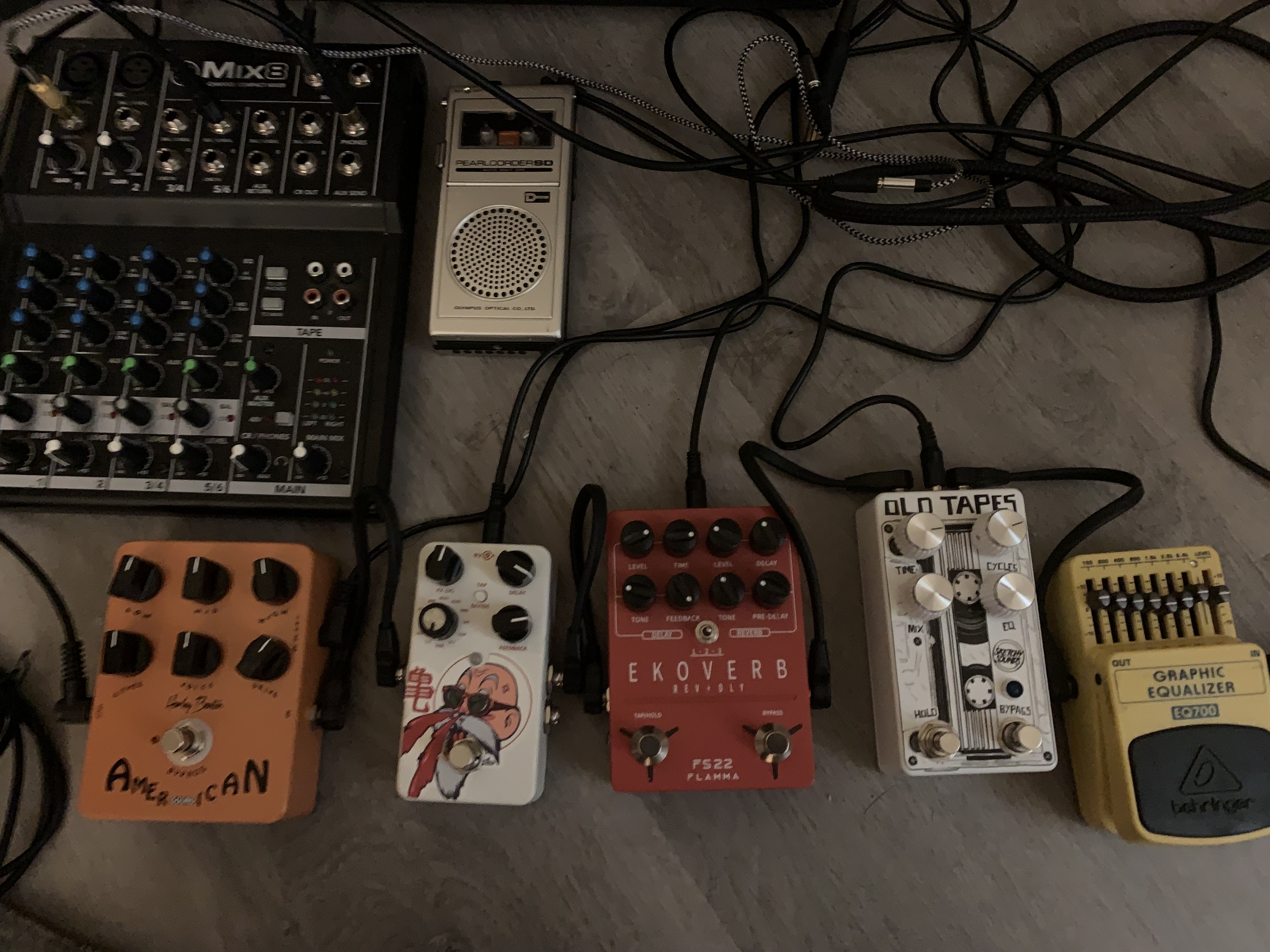 Guitar pedals into a mixer into a tape recorder